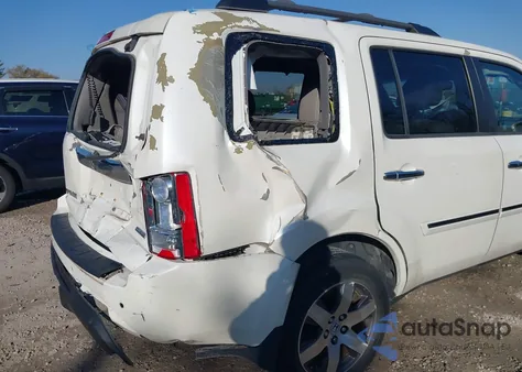 2012 Honda Pilot Touring z USA, uszkodzony, nr VIN 5FNYF3H9XCB020669